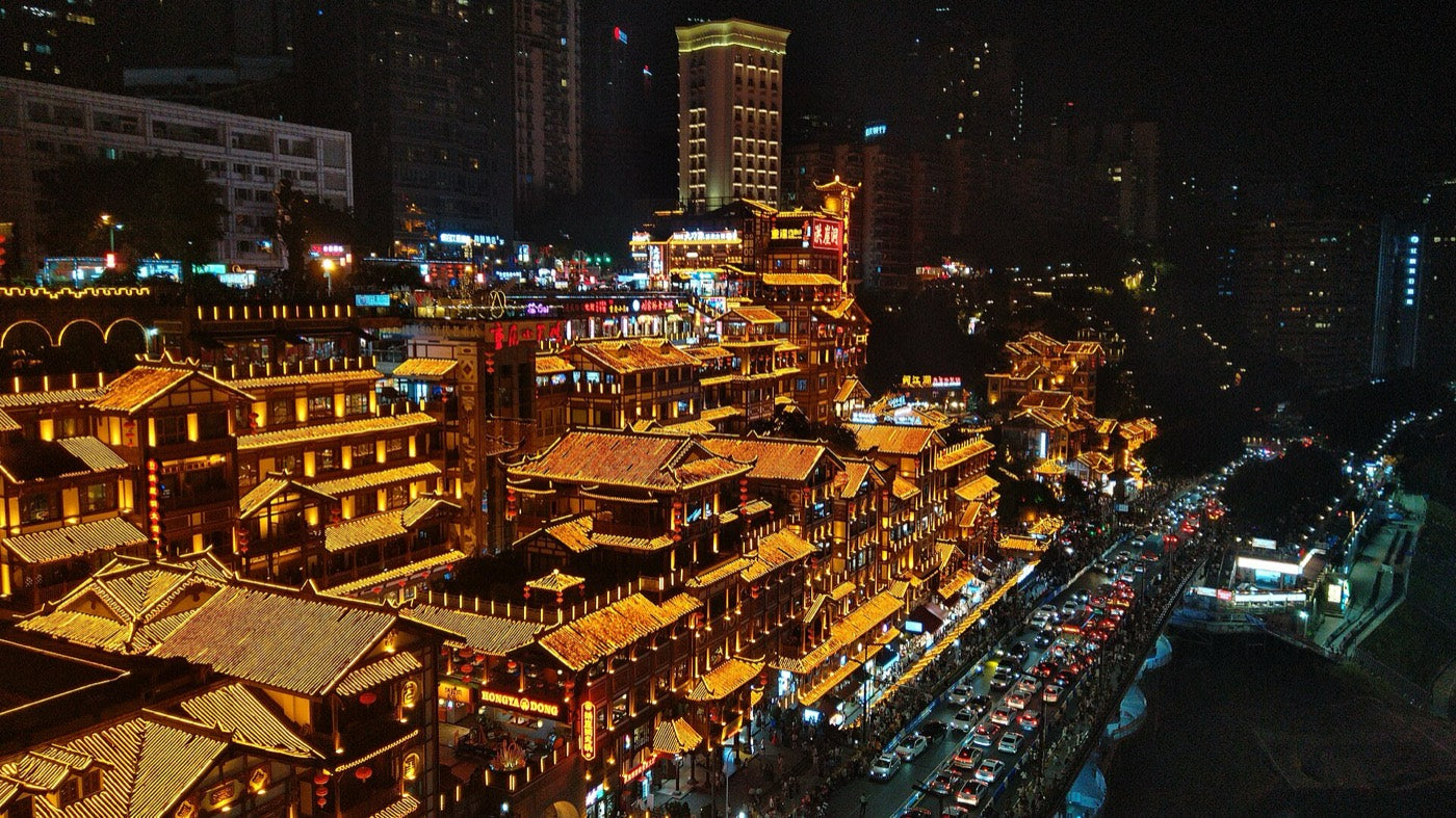 Hongya Cave illuminated at night, Chongqing